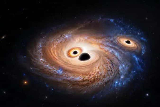 Cientistas descobrem trio de buracos negros em galáxia jovem