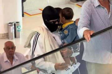 Mc Daniel apela para máscara e tenta driblar fãs e paparazzi nos aeroportos do Rio